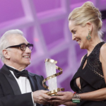 Sharon Stone receives a trophy in tribute to her lifetime career, from American film director Martin Scorsese