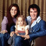 Lisa Marie Presley with her parents, Elvis (father) and Prescilla (mother)