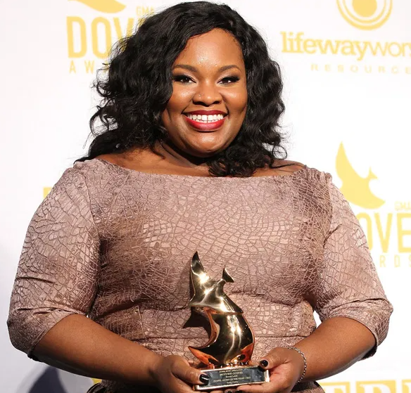 Tasha Cobbs with award