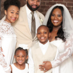 Tasha Cobbs with her husband and children