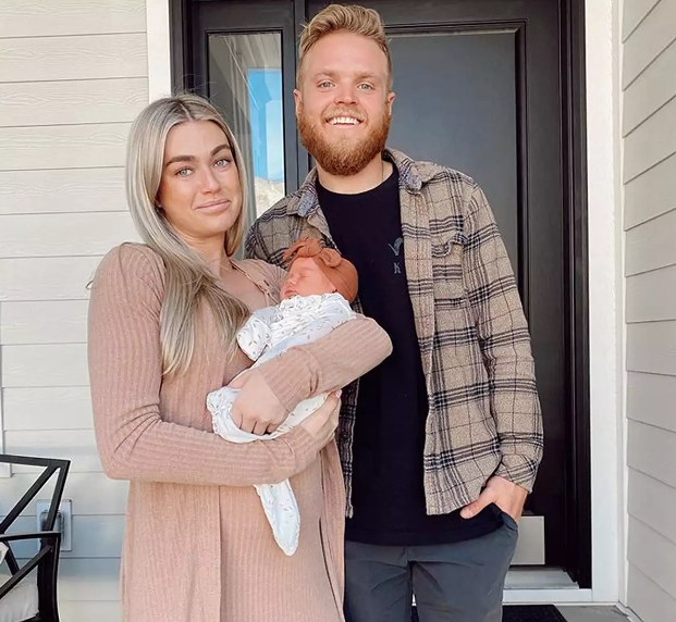 Lindsay Arnold with her husband, Sam Cusick with their daughter Sage