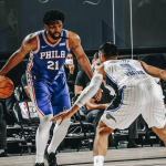 Joel Embiid with the ball against the opponent