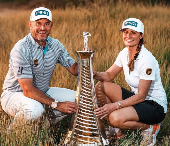 Golfer Lee Westwood and his caddie girlfriend, Helen Storey with trophy