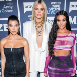 Khloe Kardashian with her sisters, Kim and Kourtney