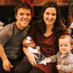 Zachary Roloff with his wife and children