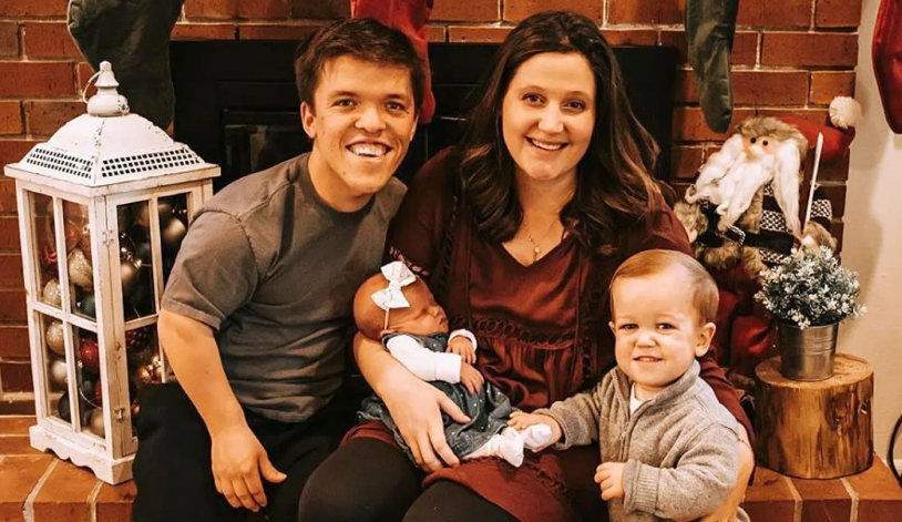 Zachary Roloff with his wife and children