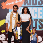 Russell Wilson with his wife, Ciara and their kids