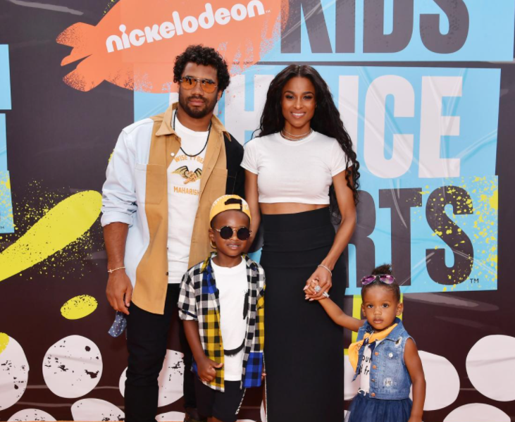 Russell Wilson with his wife, Ciara and their kids