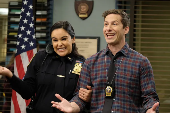 Melissa Fumero as Amy Santiago, and Andy Samberg as Jake Peralta in season 7 episode 10 of Brooklyn Nine-Nine