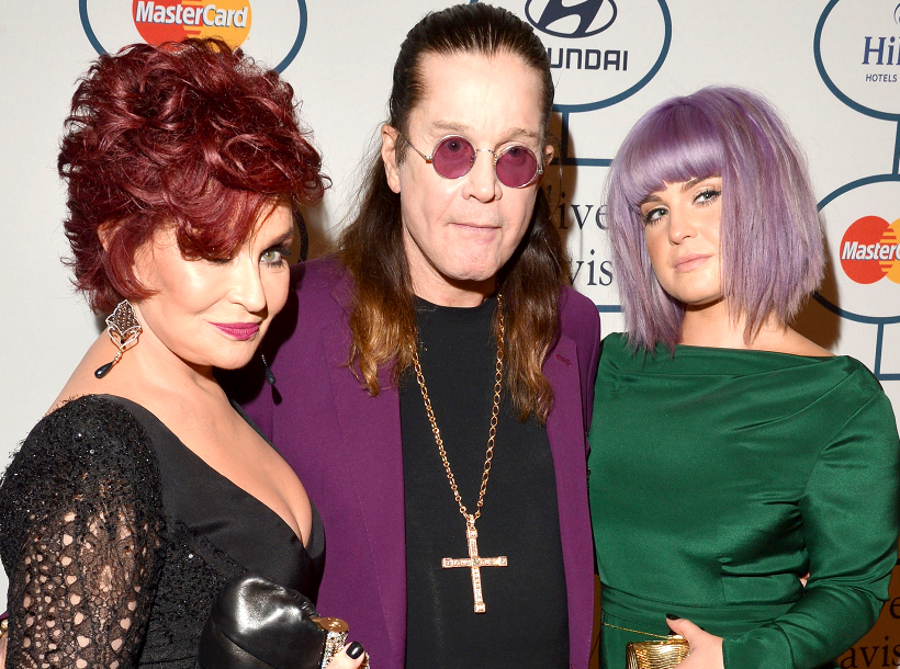 Kelly Osbourne with her father and mother