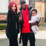Eric Bailly with his wife and son
