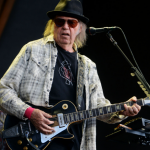 Neil Young Singing With Guitar