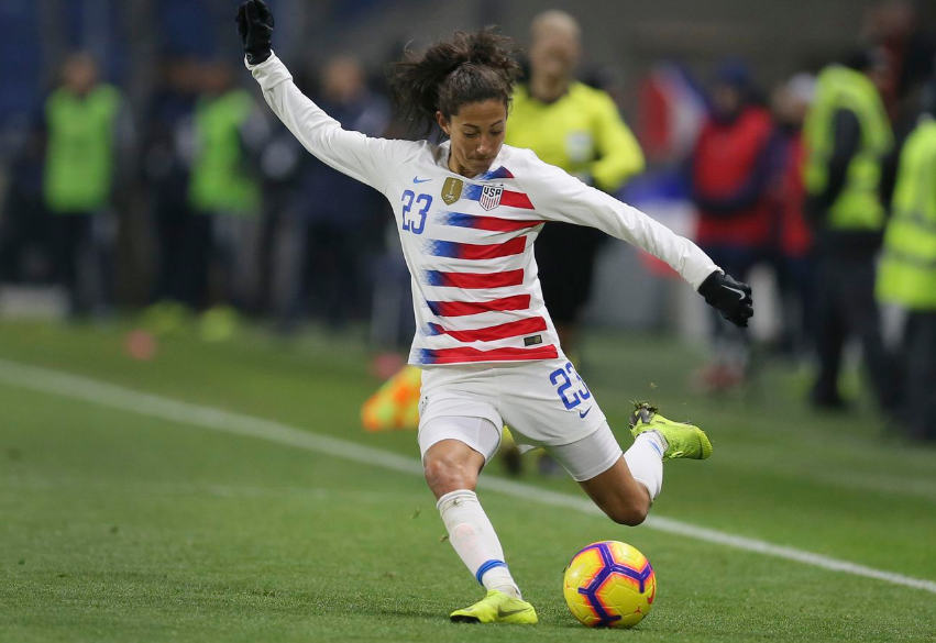 Christen Press Going To Kick The Ball