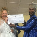 Lisa Hamme And Usman Holding Married Certificate