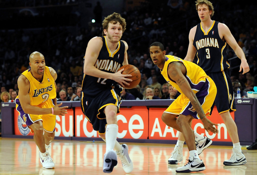 Travis Diener with the basketball against the oppoenent