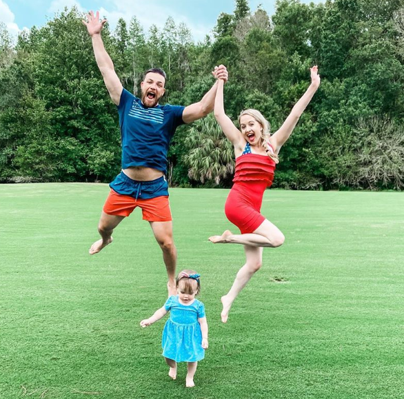 Andrei Castravet with his wife, Elizabeth and their cdaughter