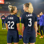 Sam Mewis with her sister, Kristie Mewis