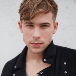 Tommy Dorfman Famous For