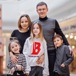 Daneliya Tuleshova with her parents and two siblings