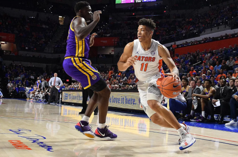 Keyontae Johnson heading the ball against the opponent