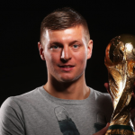Toni Kroos Holding World Cup Trophy