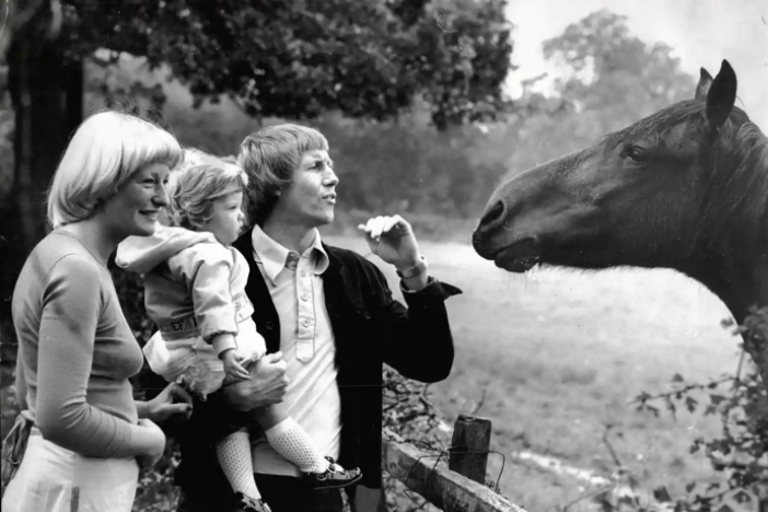 Colin Bell with his wife, Marie and their kid