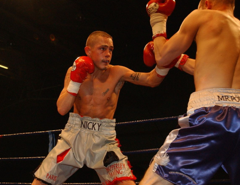 Nicky Booth fighting against the opponent