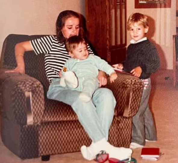 Alev Aydin with his mother and brother