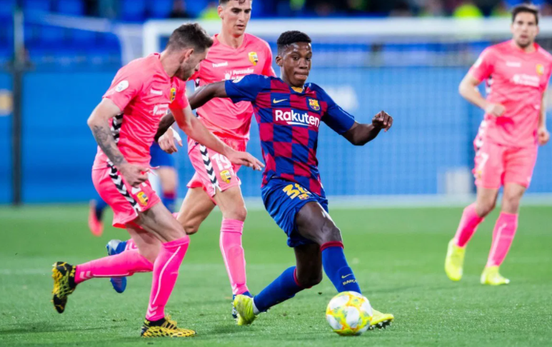 Ilaix Moriba Heading The Ball Against The Opponent