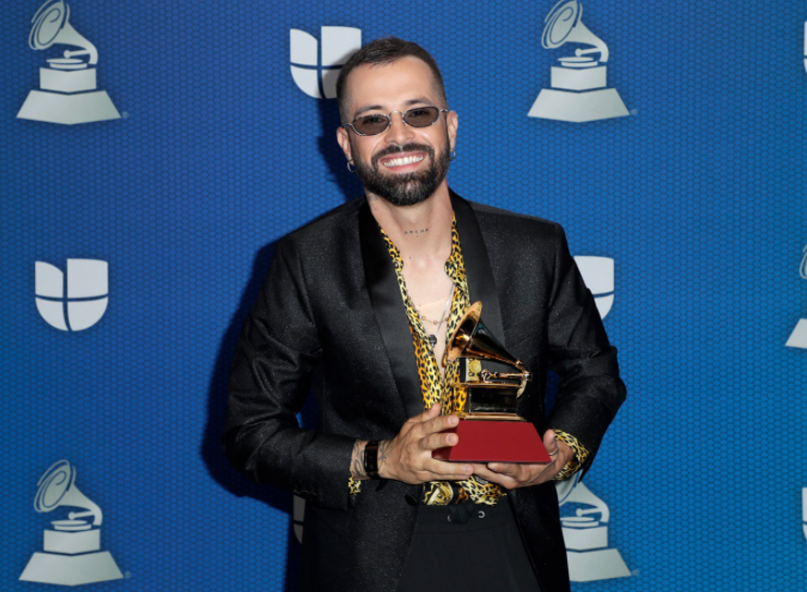 Mike Bahia with his Grammy Award
