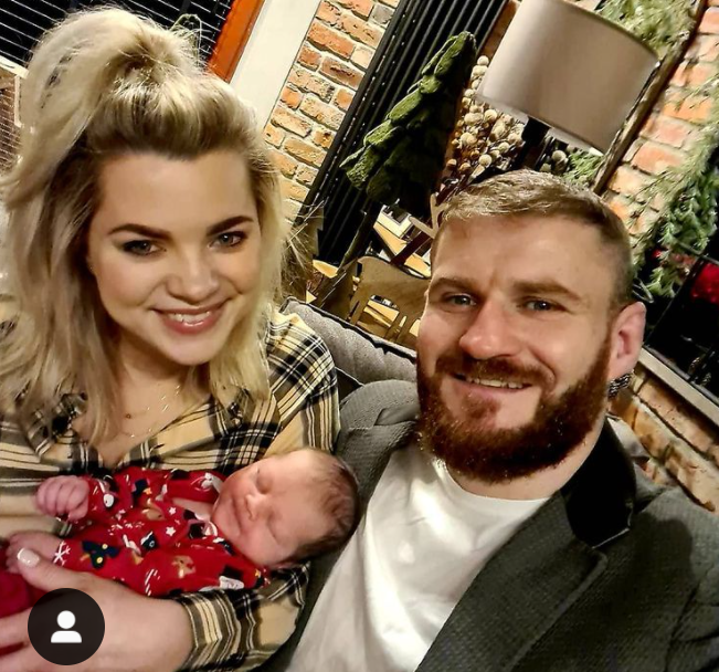 Jan Blachowicz with his girlfriend, Dorota and their son