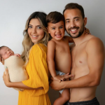 Everton Ribeiro with his wife and their kids