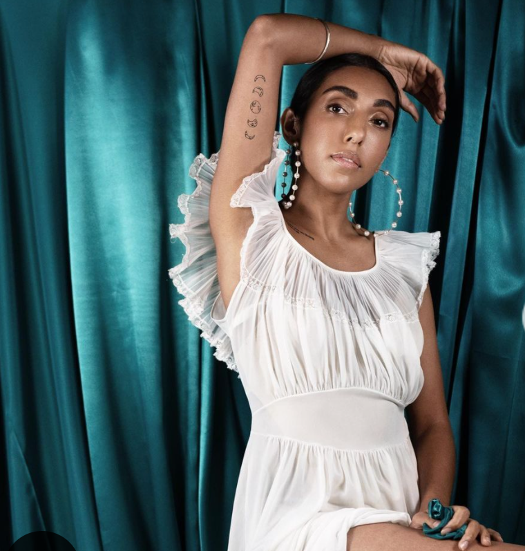 Rupi Kaur, an Indian-born Canadian poet, illustrator, and author