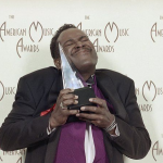 Luther Vandross with award