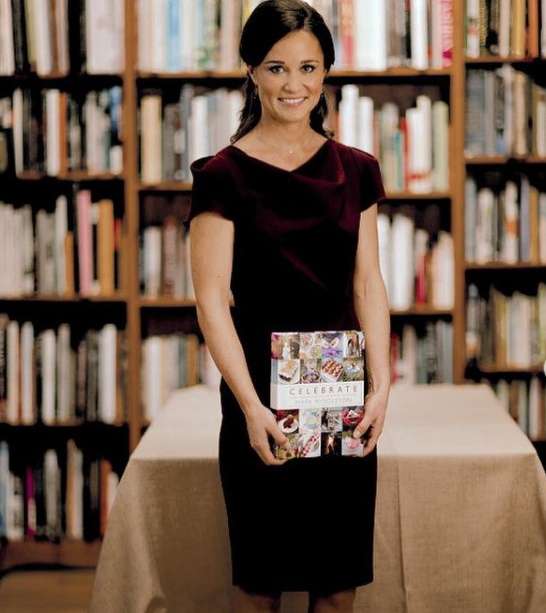 Pippa Middleton poses for photos as she promotes her book ‘Celebrate A Year Of Festivities For Family and Friends’ at Daunt Books in London