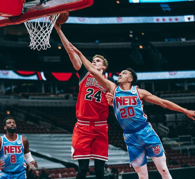 Lauri Markkanen Scoring Ahead Against The Opponent