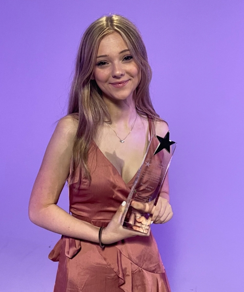 American Actress, Sophie Grace with her award