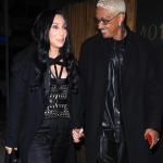 Cher and Alexander Edwards Hold Hands